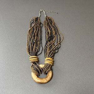 Bohemian Multi-Strand Beaded Necklace with Golden Wood Ring